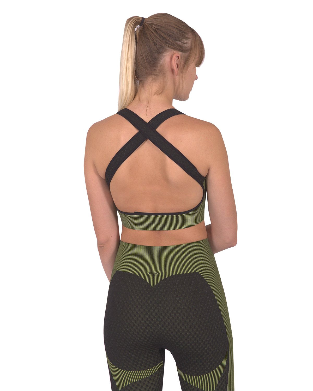 Black Lazurite Trois seamless sports bra with green accents, designed for activewear and comfortable support during workouts.