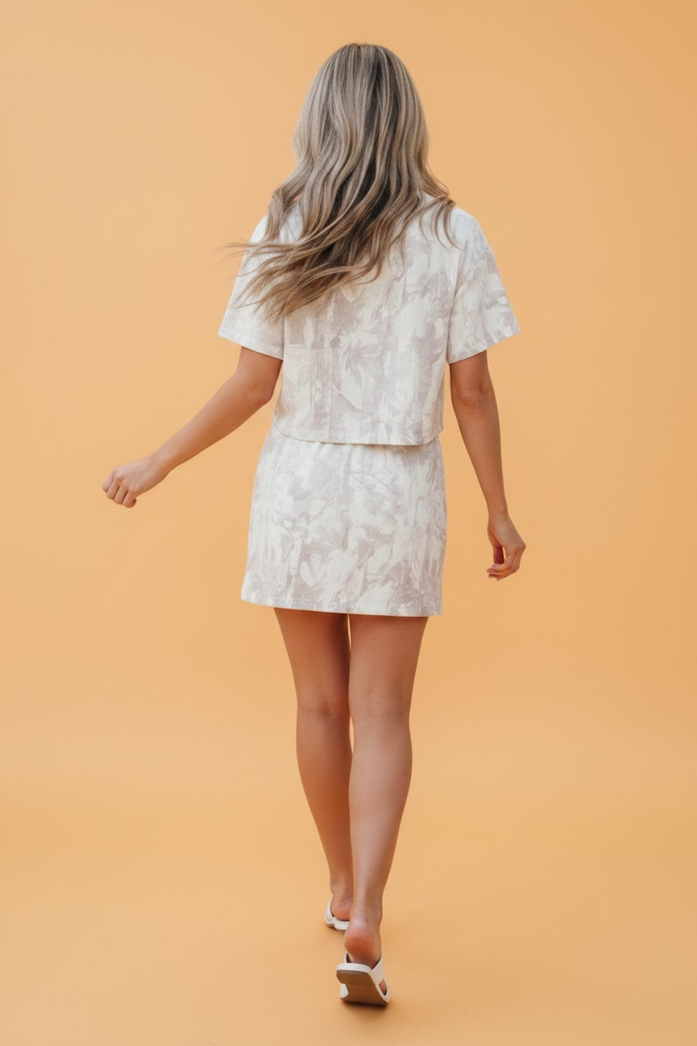 Woodland camo raw edge cropped top and skirt set for women by Byzantium Bay, featuring a stylish camouflage pattern and casual fit.