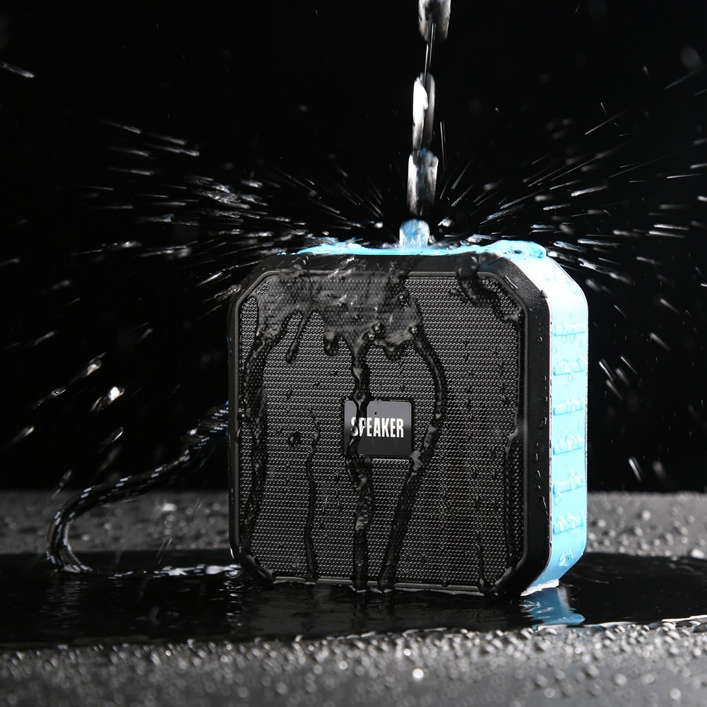 Teal Simba waterproof portable wireless Bluetooth 5.0 speaker for outdoor use, showing black speaker with control buttons and waterproof design.