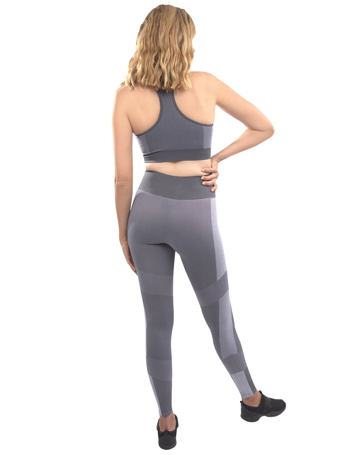 Lazurite Arleta seamless grey leggings and sports bra set for women, highlighting the comfortable, form-fitting activewear ensemble.