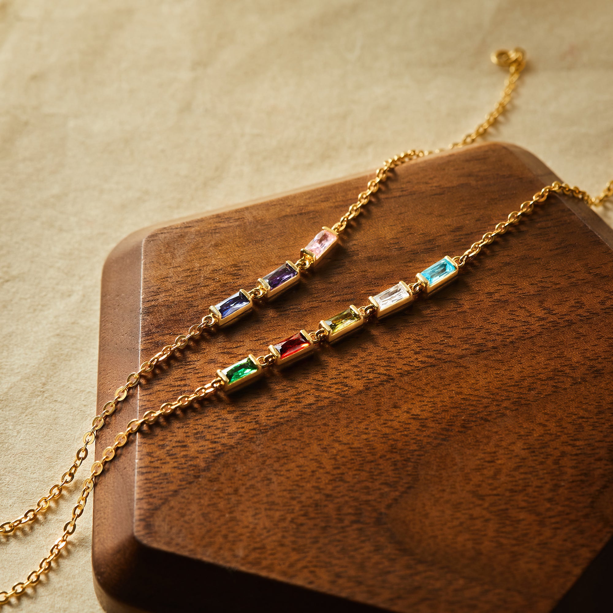 Green Millie mom bracelet featuring colorful birthstones and delicate chain design, perfect for sentimental jewelry.