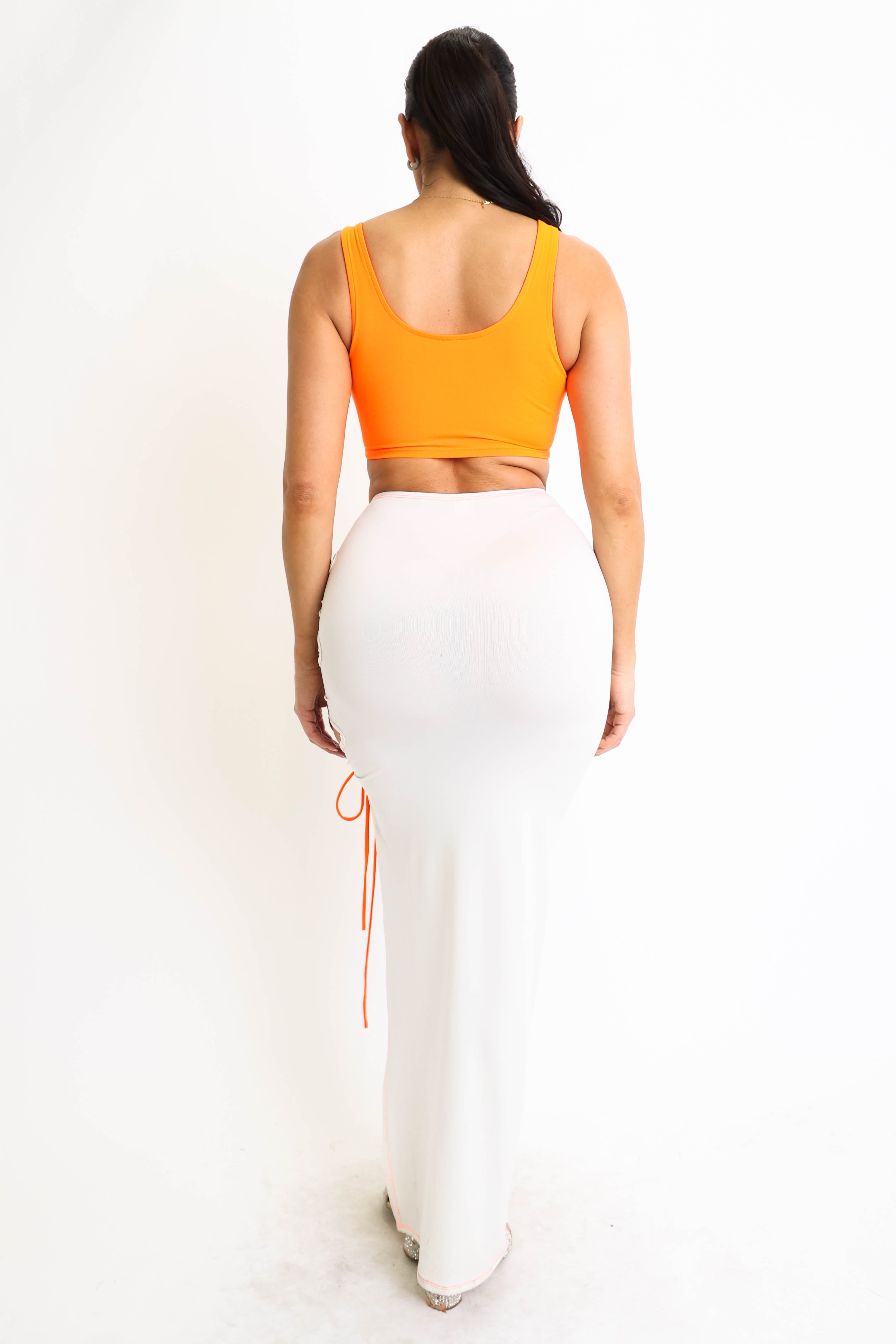 ColorBlock side lace-up top and matching maxi skirt set by Puce Juniper, featuring vibrant colors and stylish design.