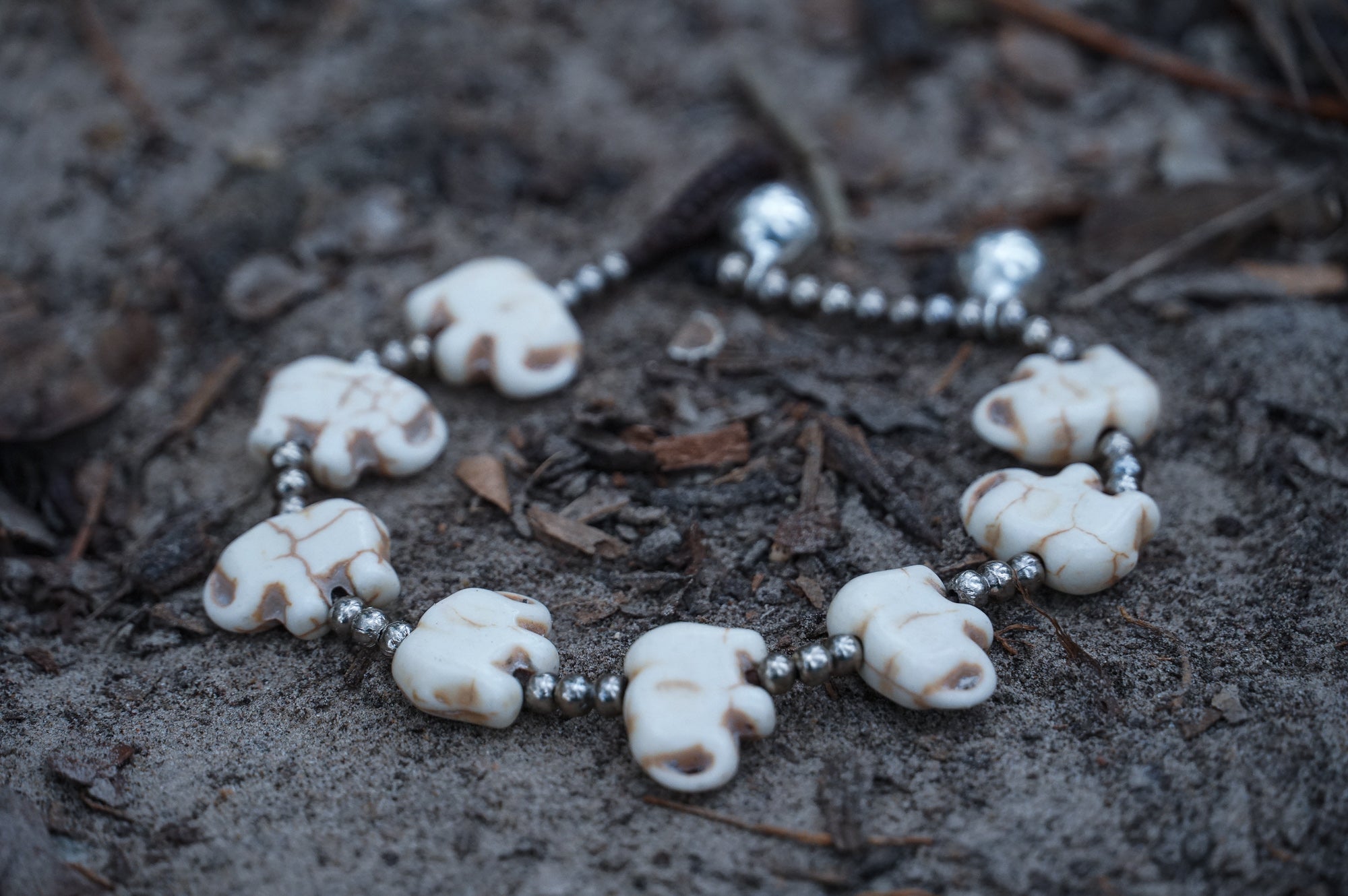 Silver Elephant Stone Bracelet by Tan Smokey featuring silver and stone beads on a stylish bracelet design.