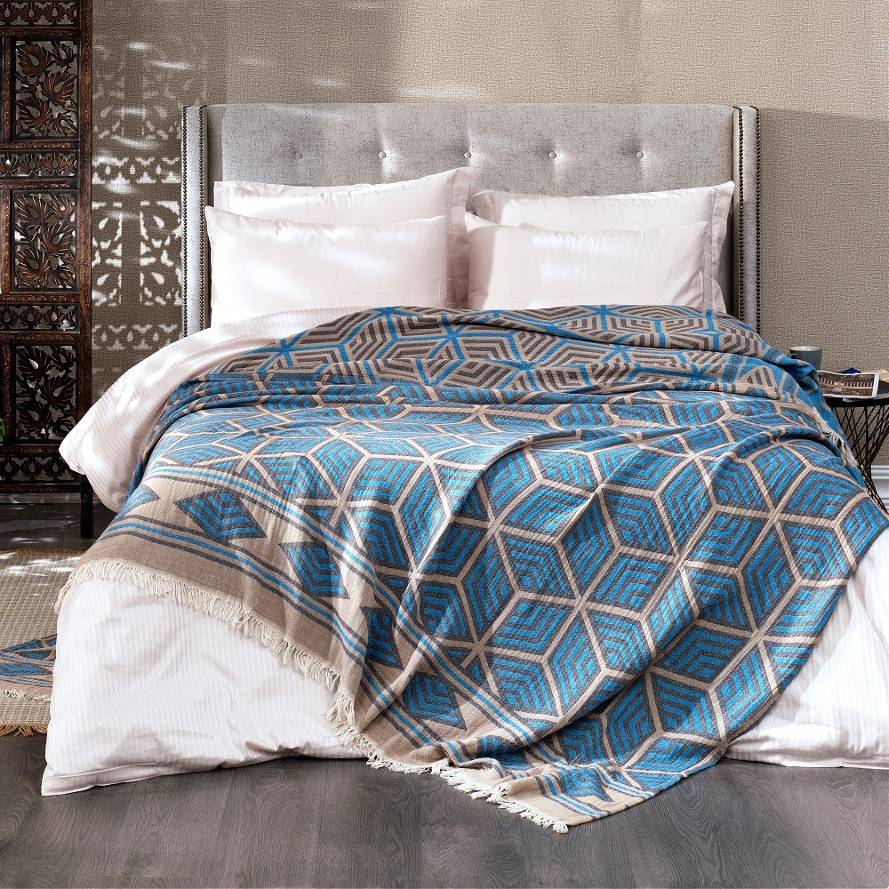 Olive Rose Ela Soft Jacquard Cotton Bedspread showcasing intricate woven pattern on a neatly made bed.