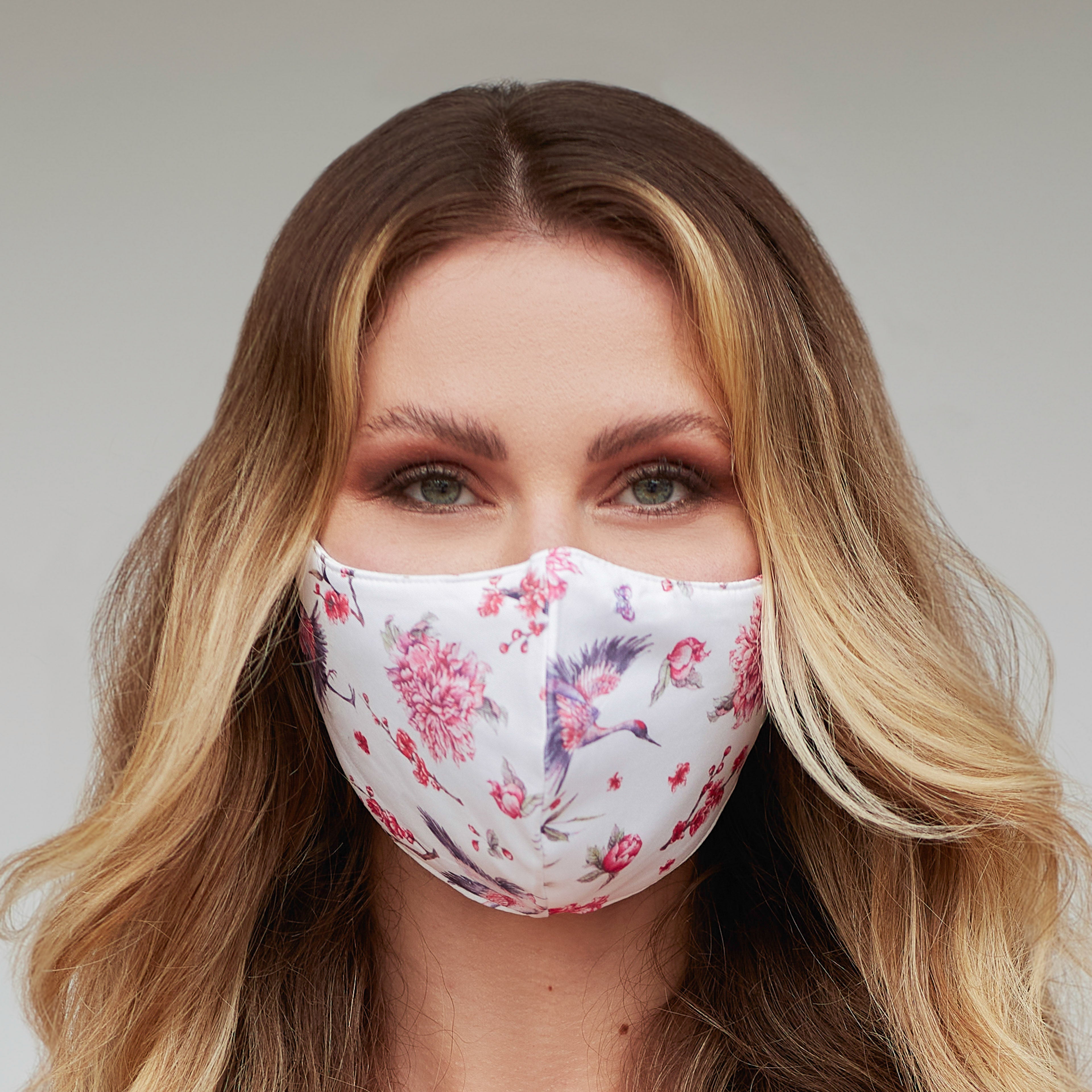 Pink Birds face mask for women by Cyan Poppy, featuring a colorful bird pattern on soft fabric.
