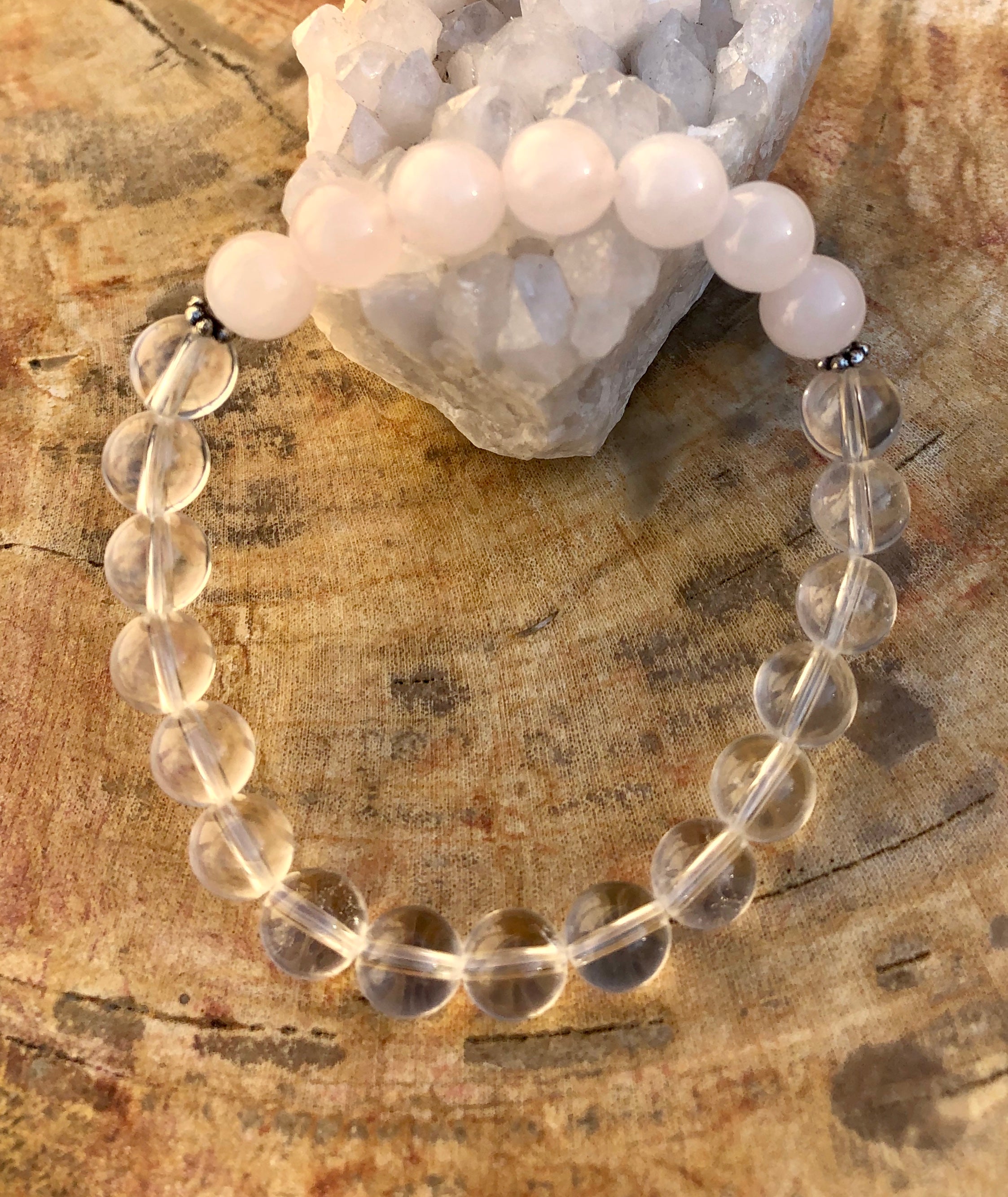Violet Chaos rose quartz and crystal quartz stretch bracelet with genuine gemstone beads, elegant and natural jewelry accessory.