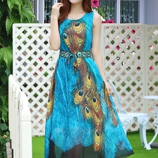 Yellow Pandora sleeveless peacock-themed long dress with vibrant blue and green peacock feather patterns, flowing fabric and elegant design.