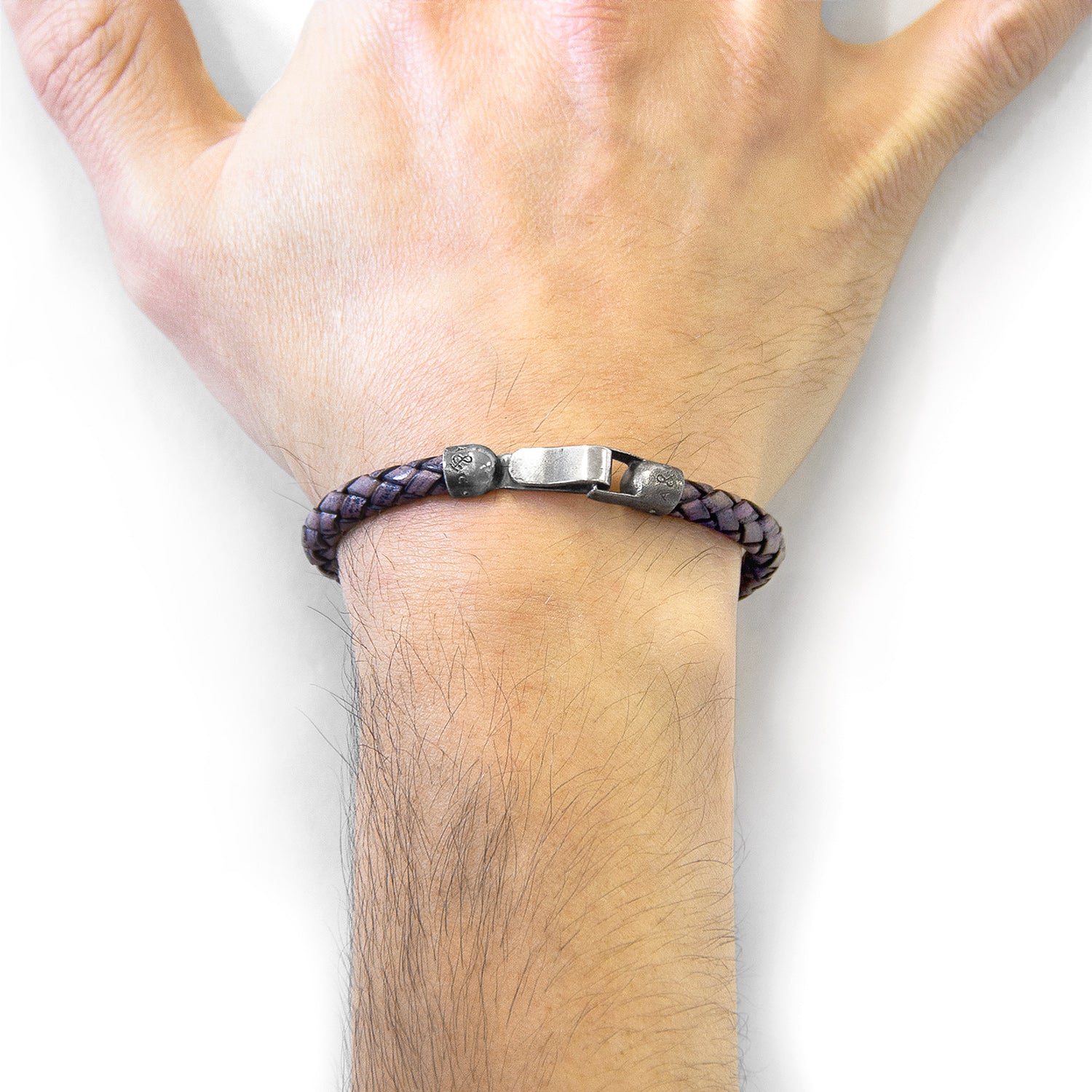 Indigo blue Skye silver and braided leather bracelet by Magenta Sooty featuring silver accents and handcrafted leather details.