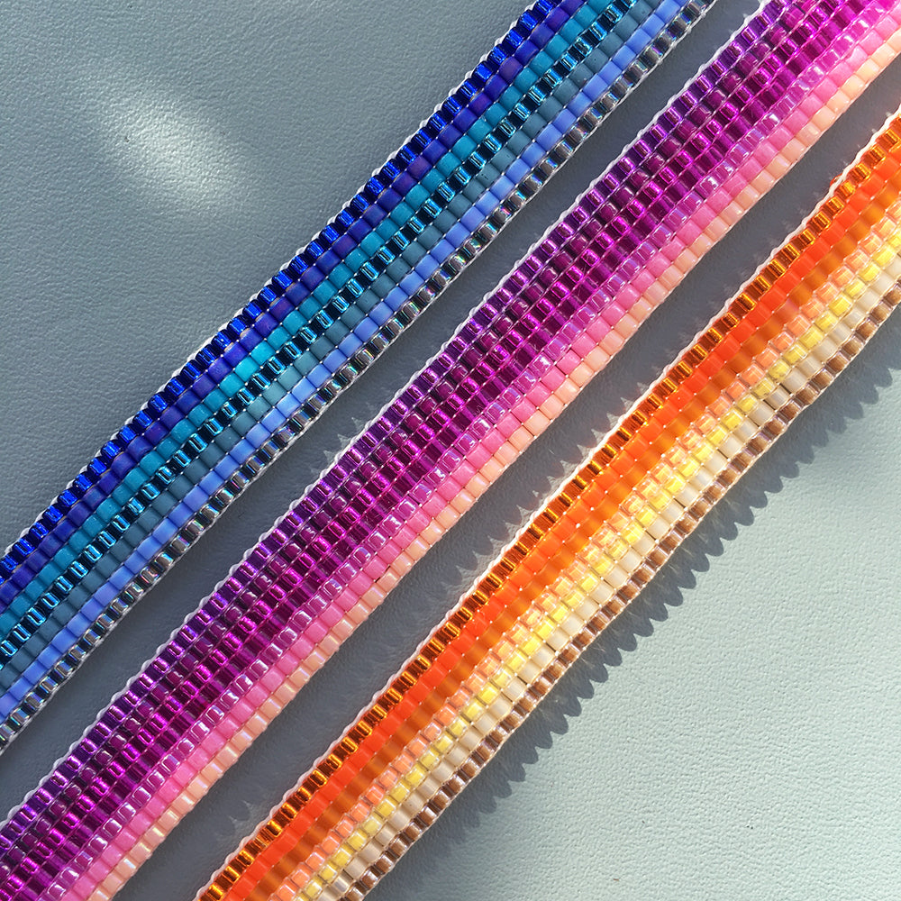 Yellow Athena Skinny Ombre Bracelet featuring blue, pink, and orange gradient colors, stylish and vibrant accessory for wrist.