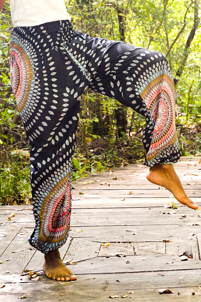 Black Lotus Women harem pants with boho and hippie style, featuring a relaxed fit and flowy fabric by Tan Smokey.