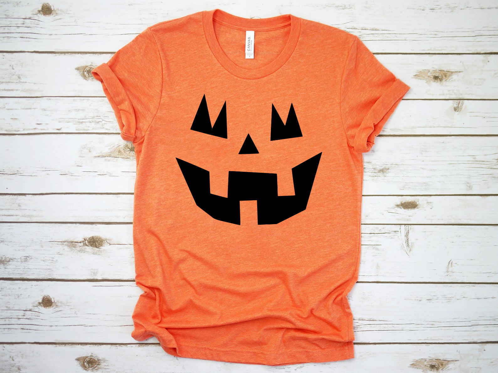 White Caeneus Halloween T-shirt featuring spooky Halloween-themed graphic on a black cotton T-shirt.