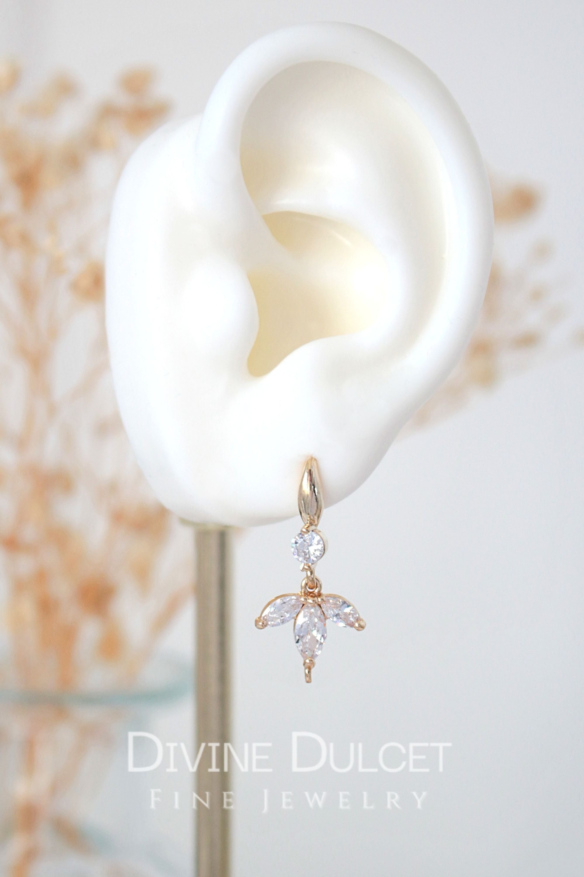 Ultramarine Birch "Bloom" 24K Cubic Zirconia Flower Petals Hook Earrings showing sparkling flower petal design and hook style.