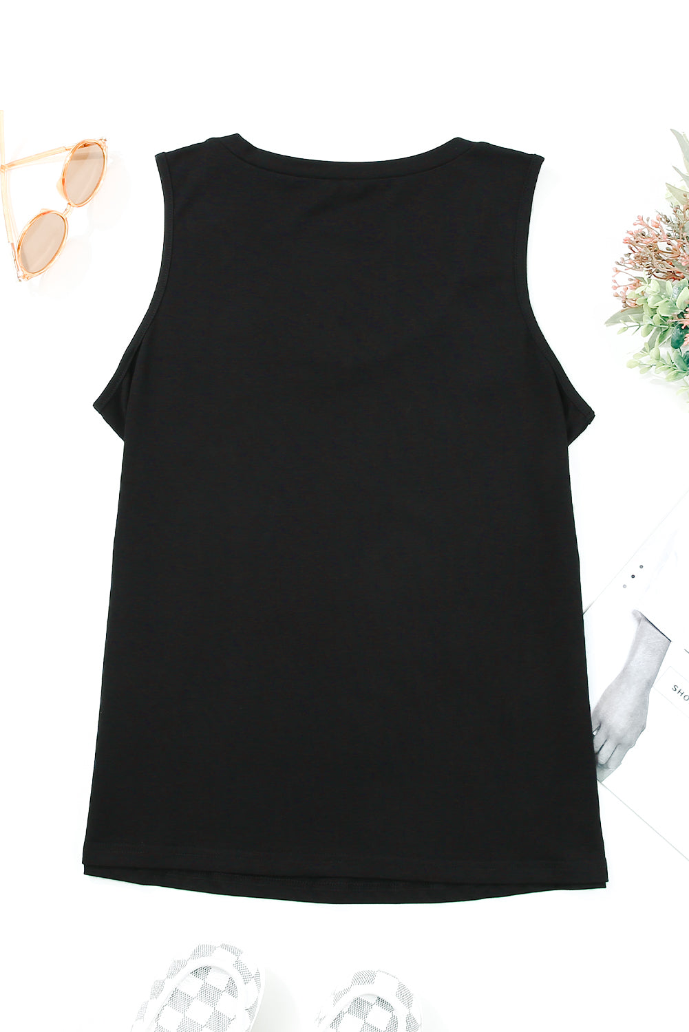 Black strappy hollow-out neck tank top from Harlequin Daisy, stylish bath and beauty apparel with cut-out design.