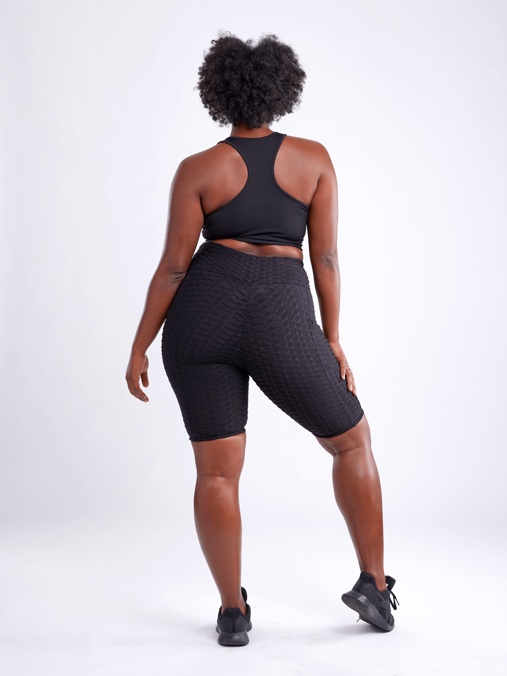 Black Lavender JupiterGear high-waisted scrunch yoga shorts with hip pockets, designed for activewear and comfortable movement.
