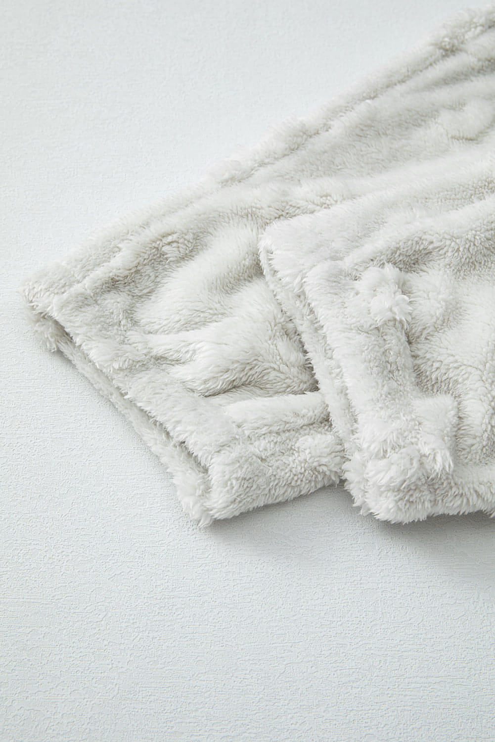 Light grey leopard textured fleece lounge set by Carmine Juneberry featuring a loose fit for comfortable casual wear.