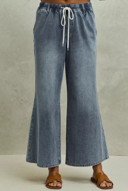 Pear Daisy SO ME Mid Rise Elastic Waist Flare Denim Jeans for women, showing the stylish fit and classic denim texture.
