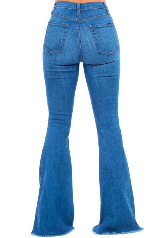 Jade Icarus automotive bell bottom jeans with pink ribbon detail, stylish denim pants featuring flared design and decorative accents.