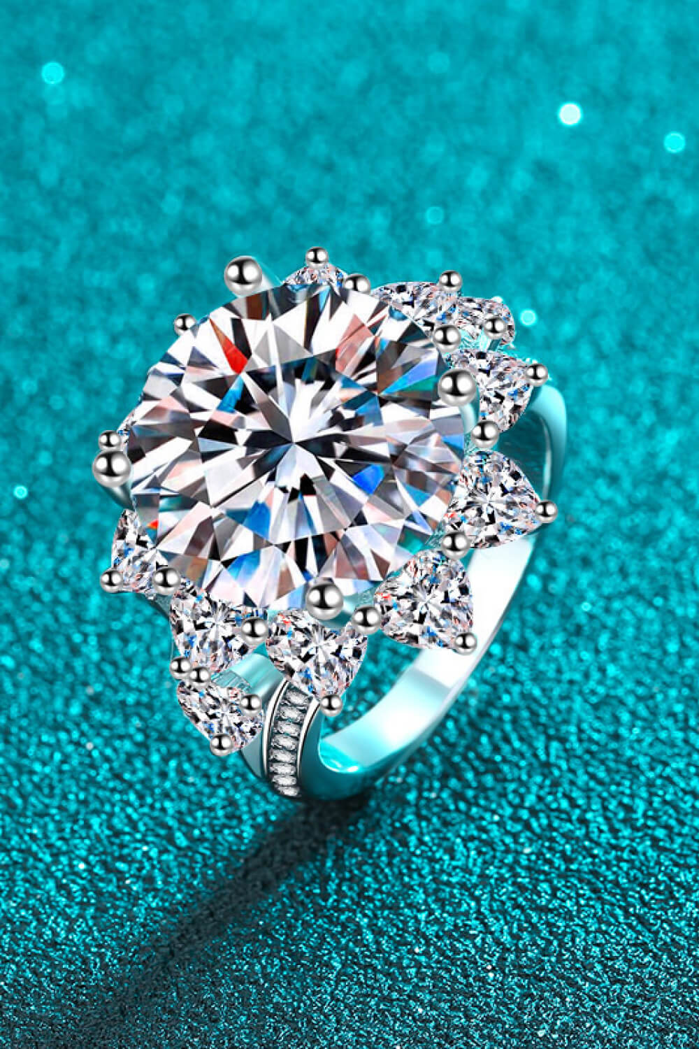 Pear Daisy 10 carat moissanite flower-shaped ring showcasing a sparkling floral design for elegant jewelry or home décor.