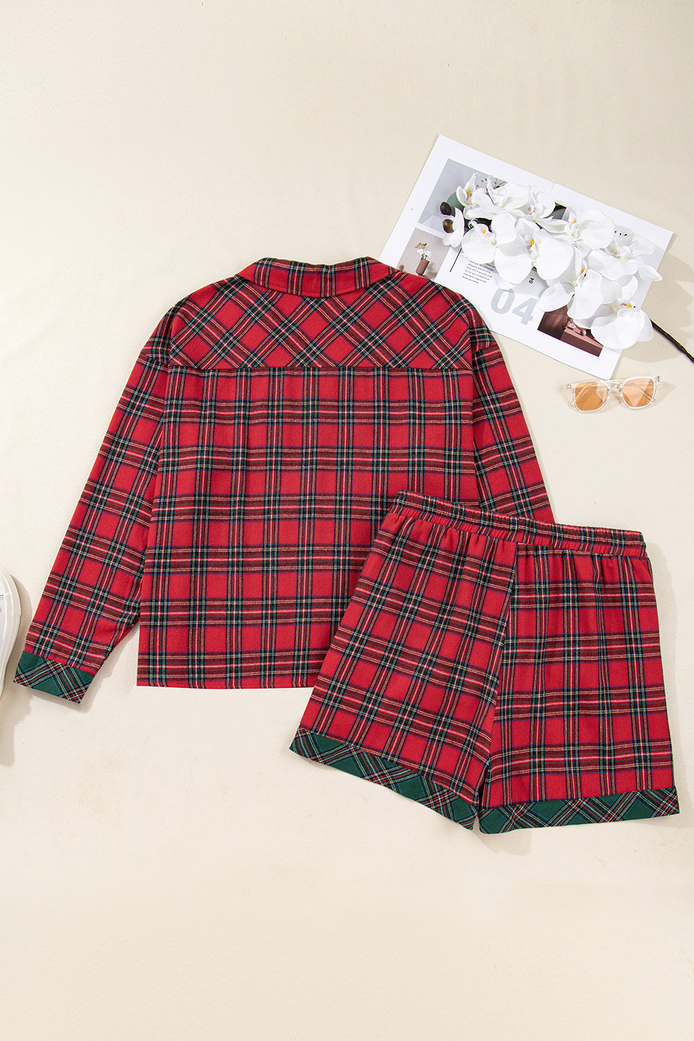 Plus size Christmas plaid pajama set with shirt and shorts by Byzantium Bay, featuring festive red and green tartan pattern.