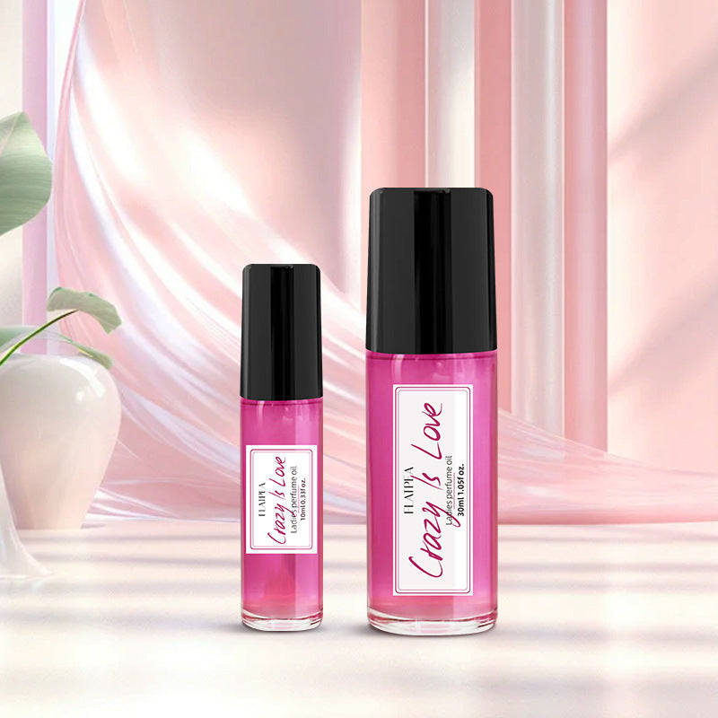 Carmine Juneberry Crazy In Love™ ball perfume oil for women, showcasing the elegant bottle with floral and fruity notes in bodycare.