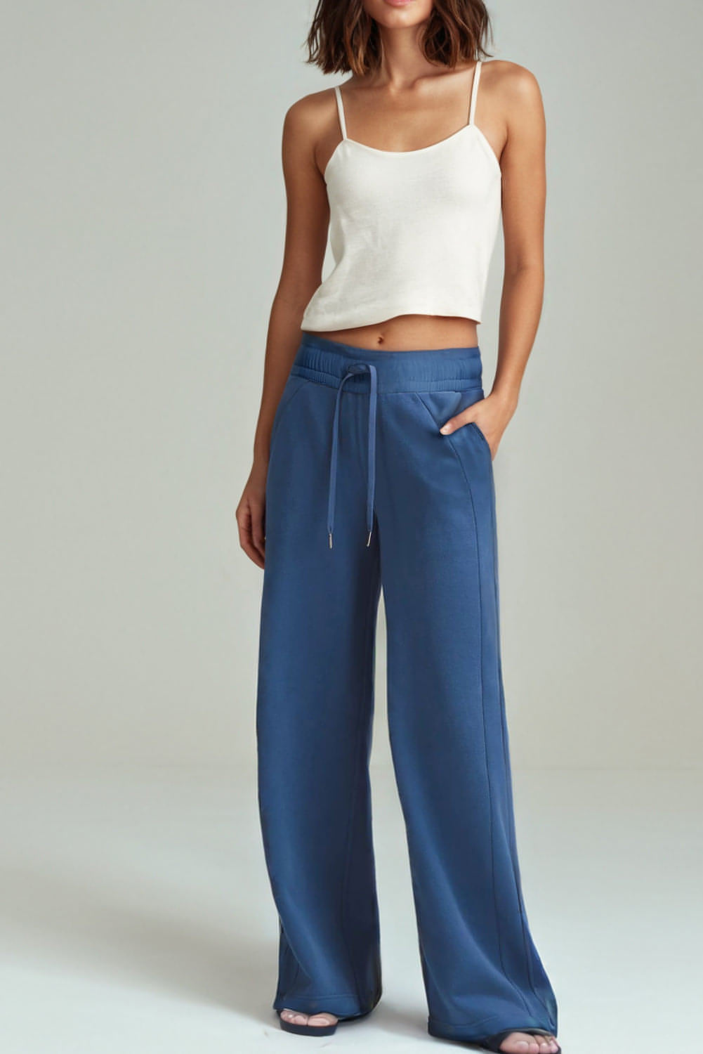 Sail blue Carmine Juneberry high waist wide-leg sweatpants with drawstrings and side pockets, made from comfortable fabric.