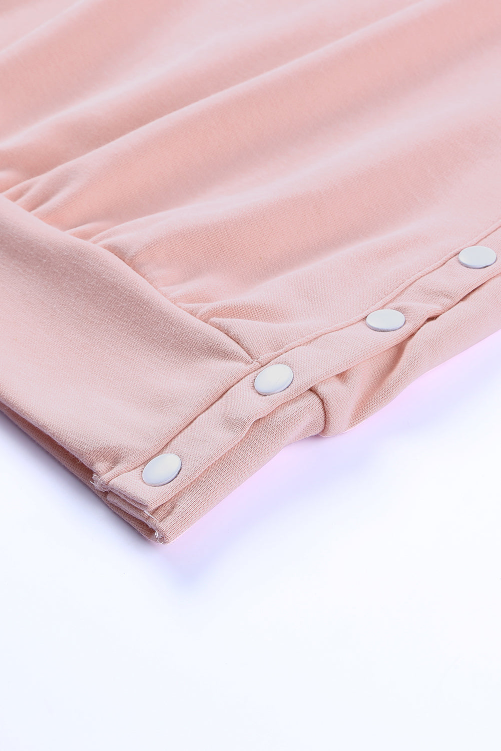 Pink crew neck slit buttons sweatshirt by Harlequin Daisy, featuring a casual fit and stylish slit button details.