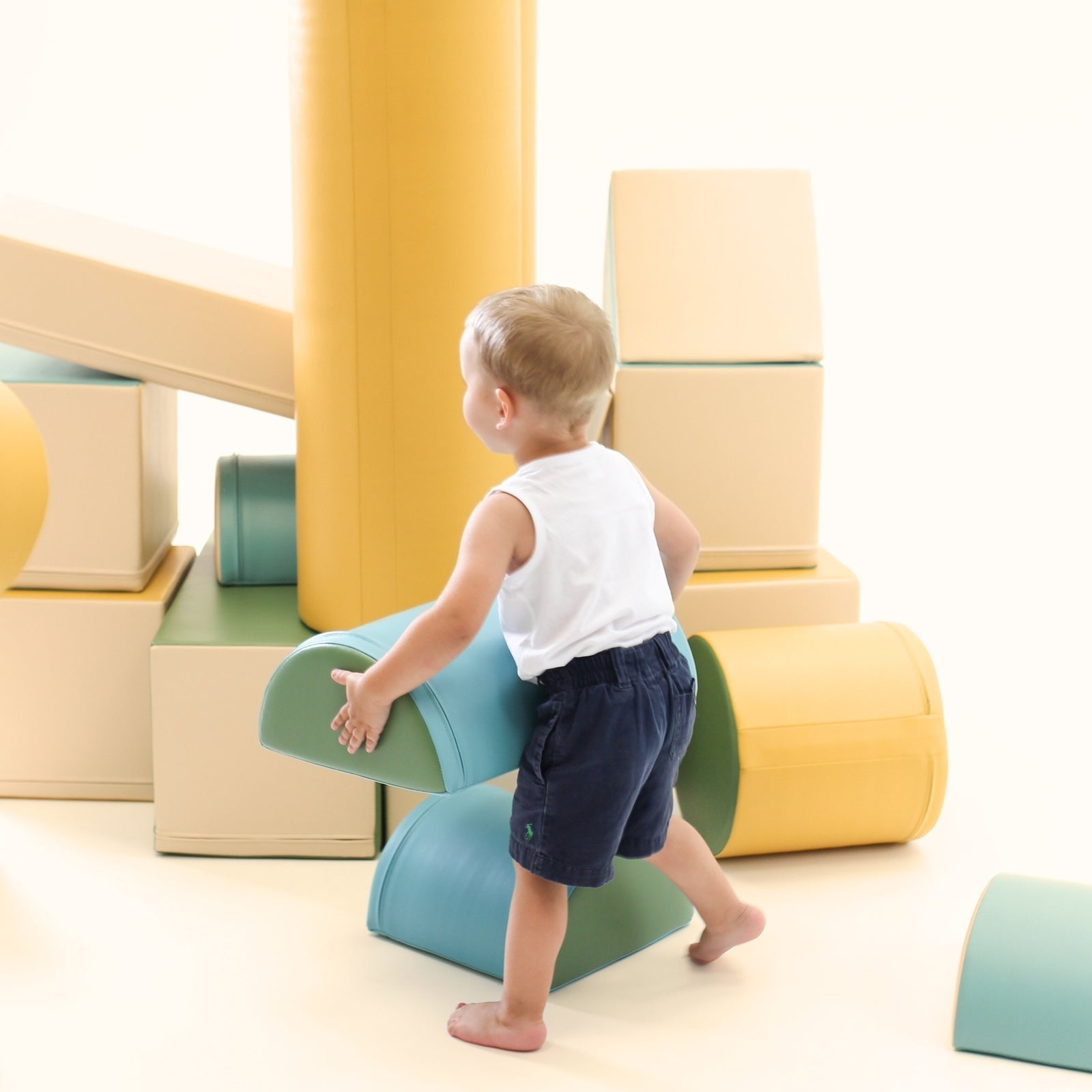 Blush Apricot Mega Fort furniture in fortress-blue soft play with multiple levels and cushioned surfaces for kids&
