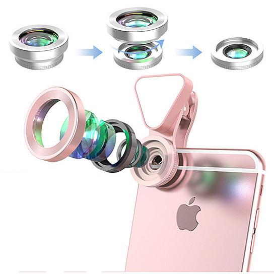 Salmon Lucky Glow Face 3-in-1 photo lens and fill lighting clip attached to a smartphone for enhanced selfies and photography.