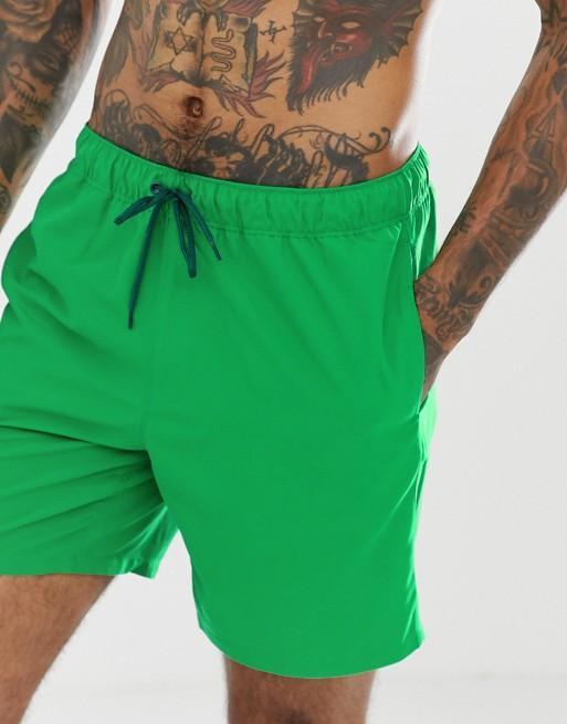 Green Sky Felix swim shorts with a relaxed fit, featuring a drawstring waistband and vibrant aquatic-inspired pattern.