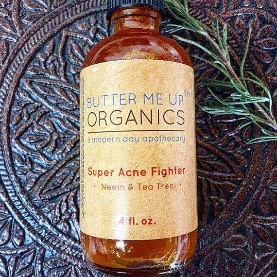 White Smokey Super Acne Fighter organic skincare treatment in a sleek jar, designed to combat acne with natural ingredients.