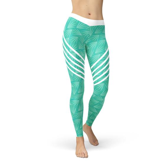 Maroon Sooty turquoise sports leggings shown on a model, featuring a fitted design and elastic waistband for active wear.