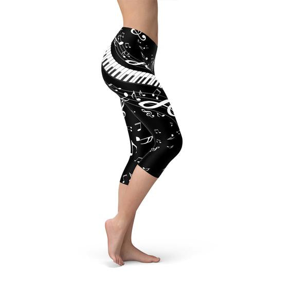 Black Capri leggings for women by Maroon Sooty featuring piano notes pattern, fitted and comfortable for everyday wear.