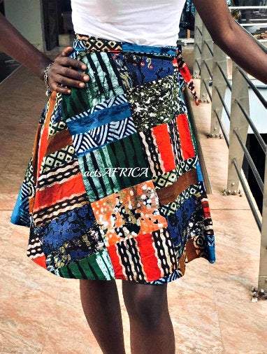 Vintage Batik wrap mini kitenge skirt featuring African round design, styled with a White Baobab T-shirt in a casual outfit.