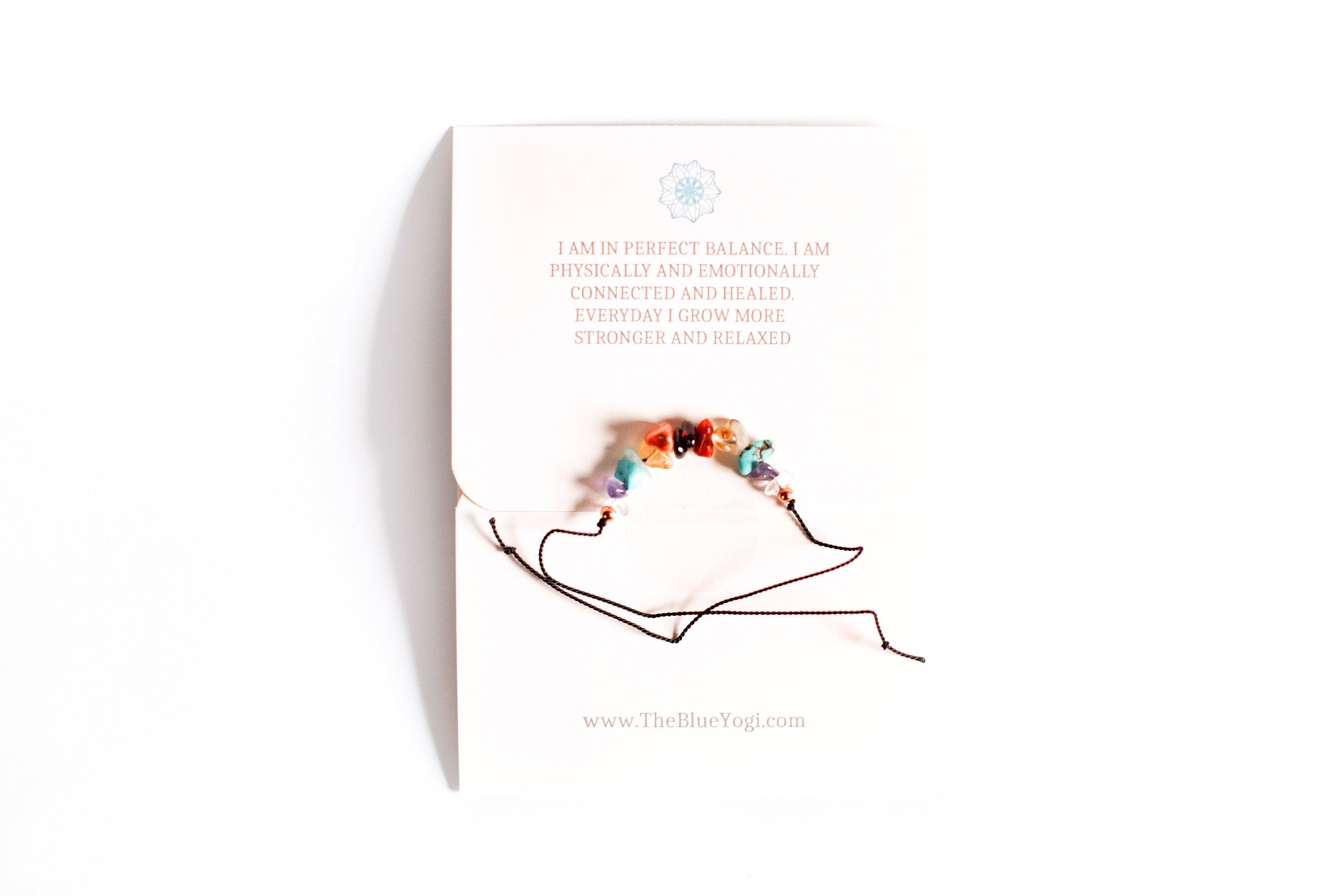 Turquoise Mulberry Chakra Balance crystal bracelet featuring eco-friendly, sustainable design with colorful beads and a silver clasp.