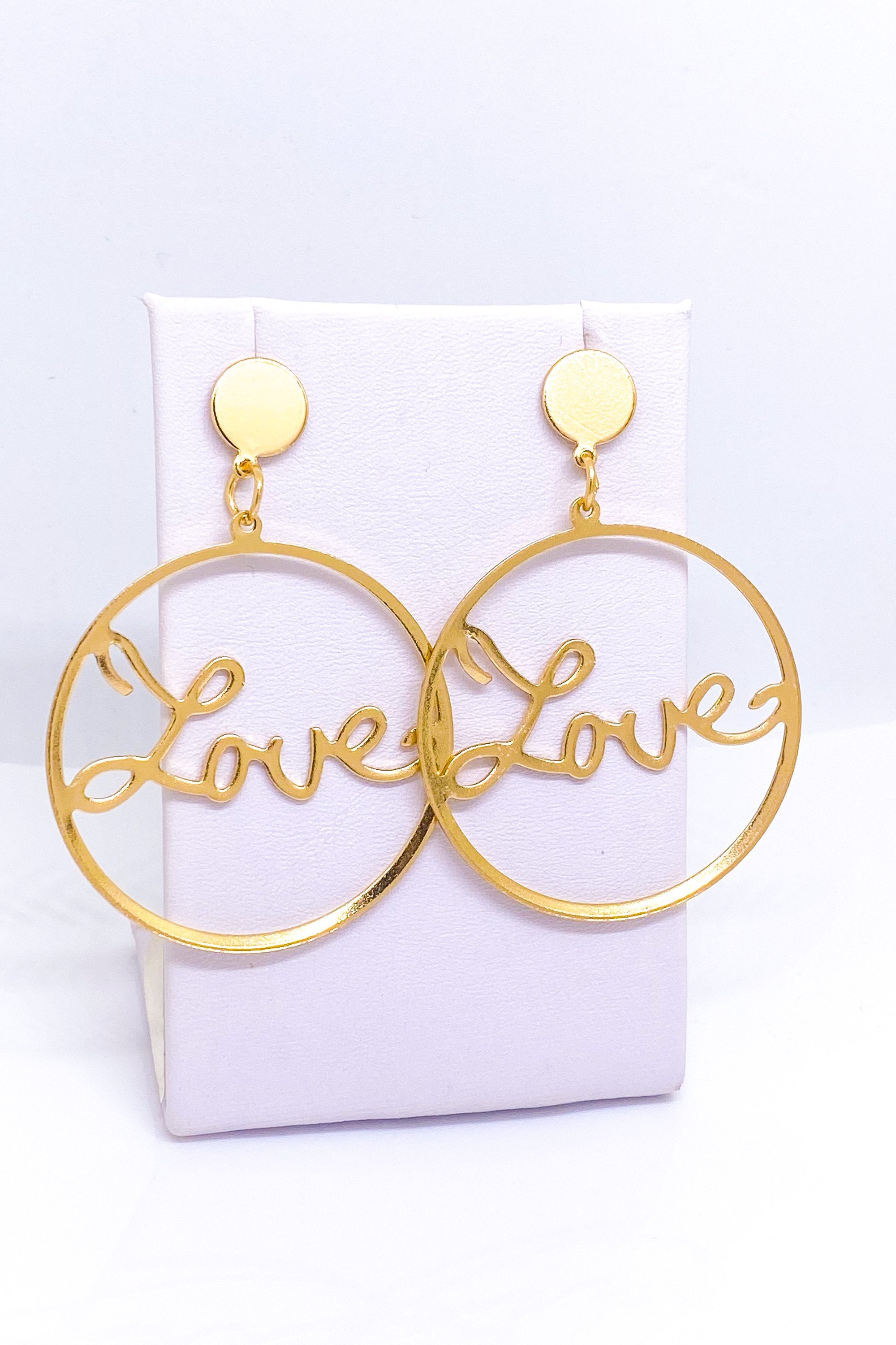 Burgundy Uranus Love Earrings, stylish hoop earrings with heart-shaped design, perfect for everyday wear and special occasions.