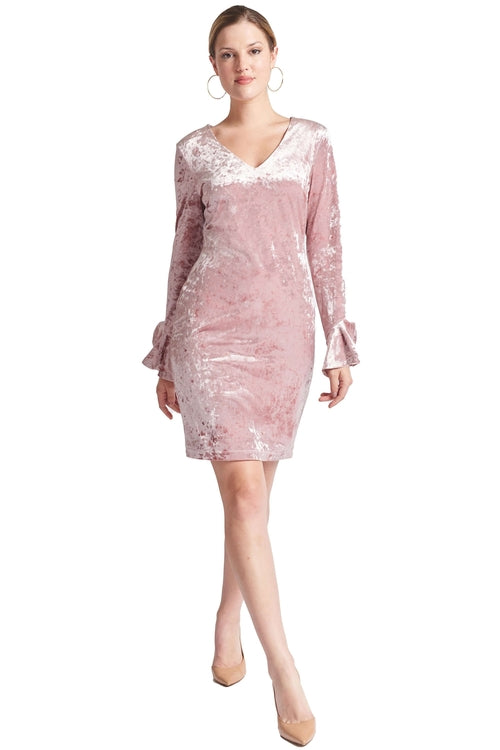 Peach Dionysus Kara Dress featuring long sleeves, crushed velvet fabric, V-neckline, and bell sleeves for a stylish look.