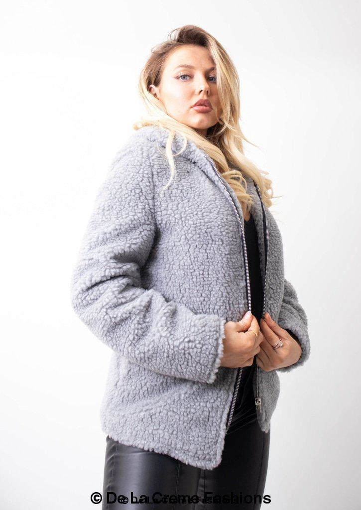 Rose Eleusis Lauren zip-up hooded borg teddy jacket with cozy fleece, front pockets, and adjustable hood, perfect for cold weather.