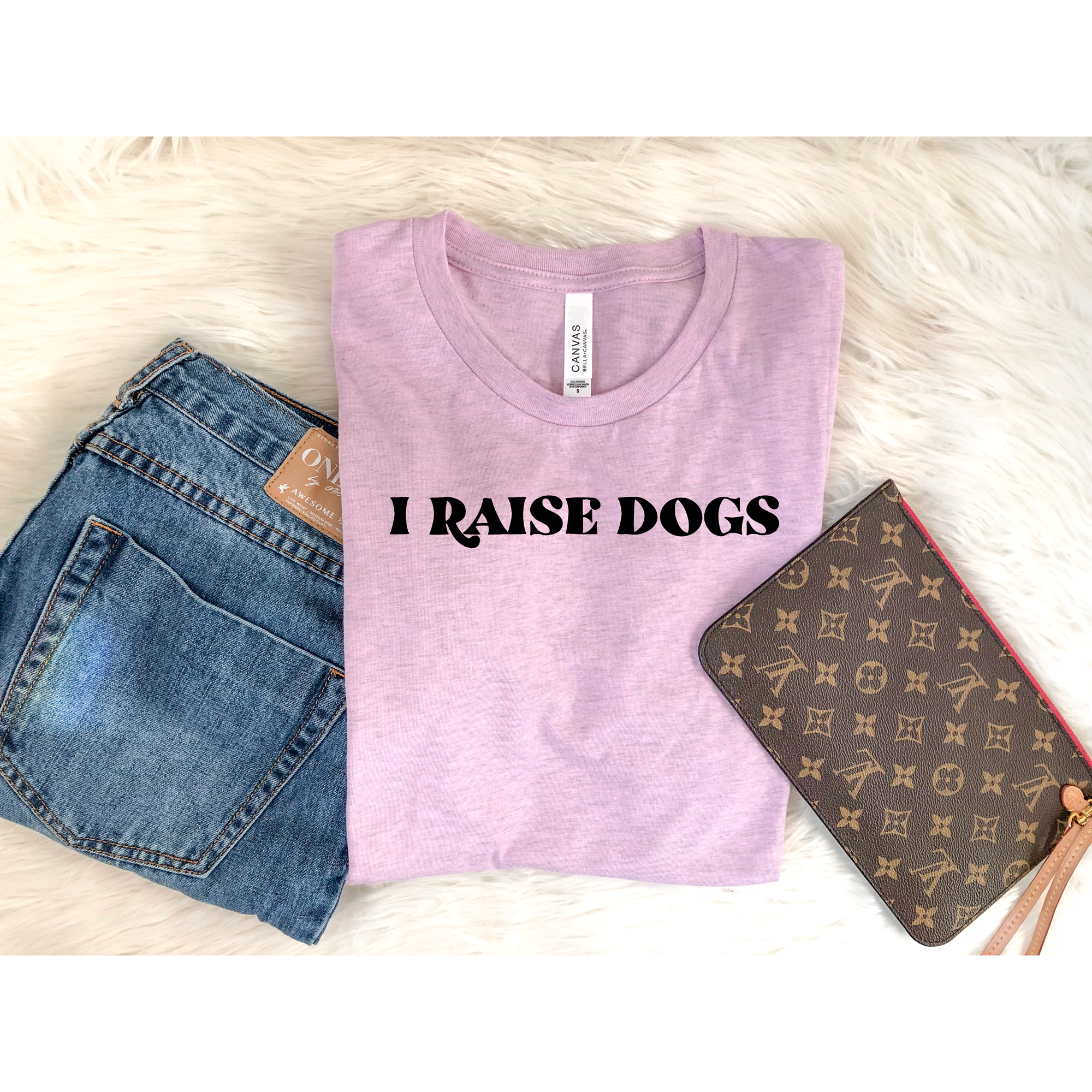 Scarlet Gaia I Raise Dogs T-shirt featuring a playful pet-themed design on a casual cotton tee for dog lovers.