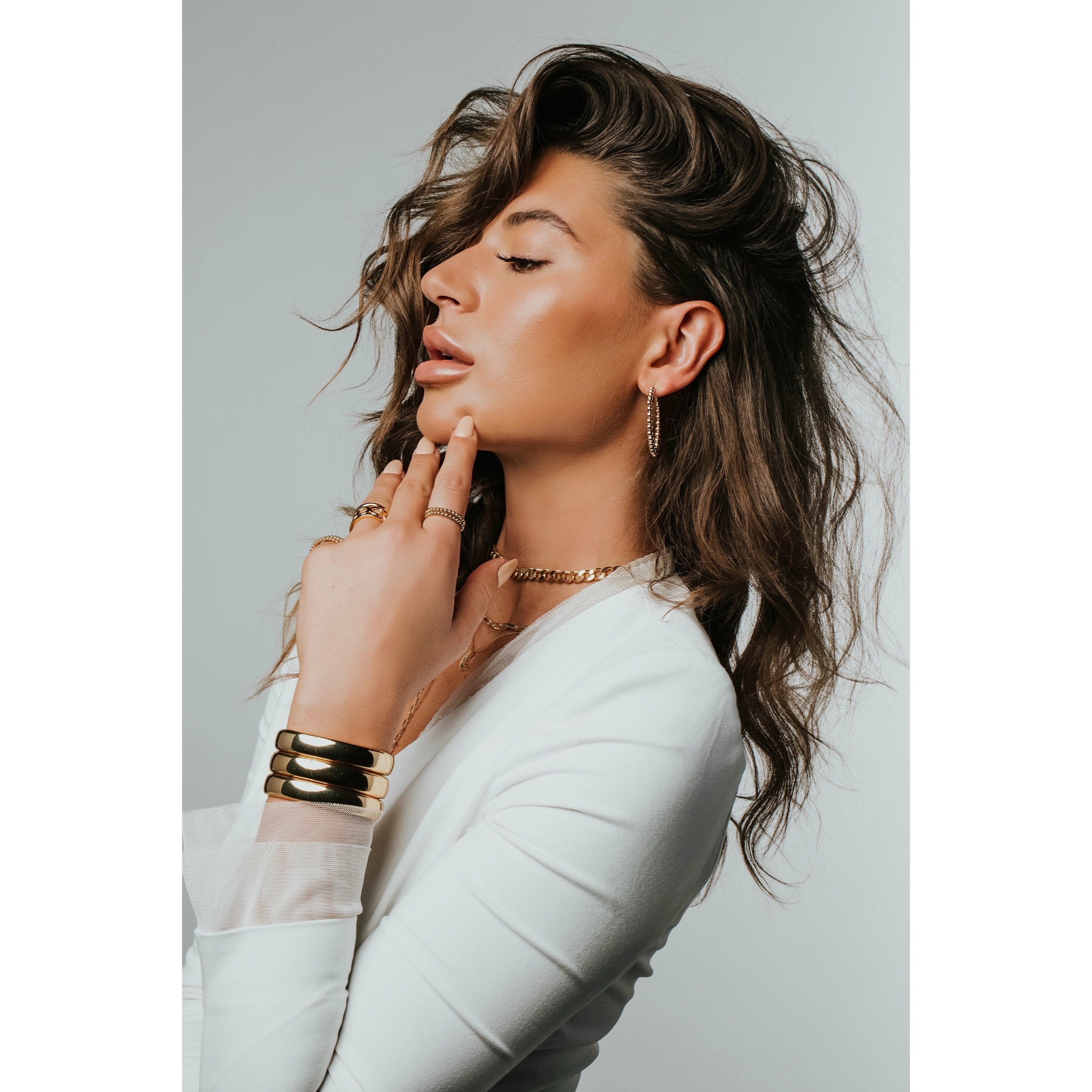 Bronze Lucy Liza bracelet with intricate bangle design, featuring artisanal jewelry craftsmanship and elegant detailing.