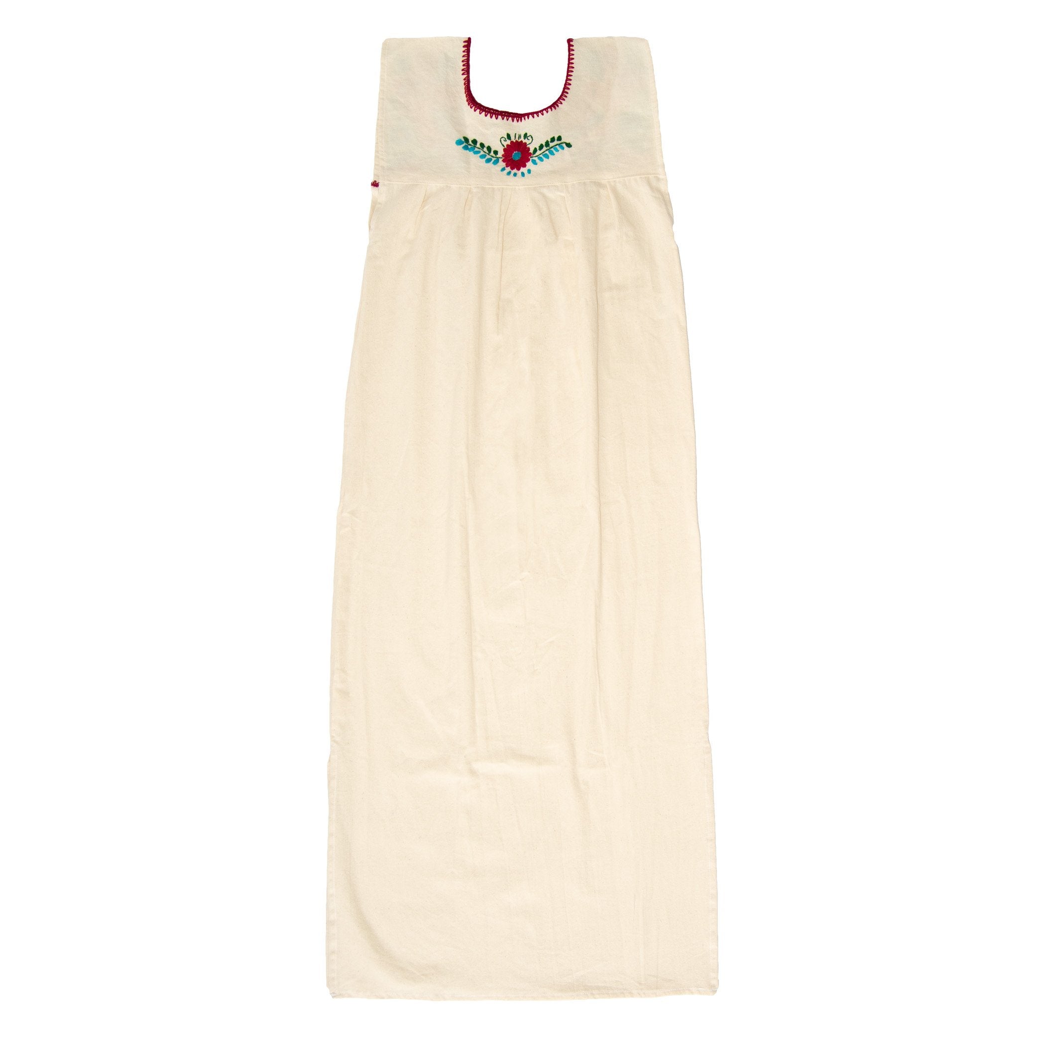 White Maxi Isidra Mexican embroidered dress by Violet Athena, featuring intricate embroidery and flowing fabric, perfect for women&