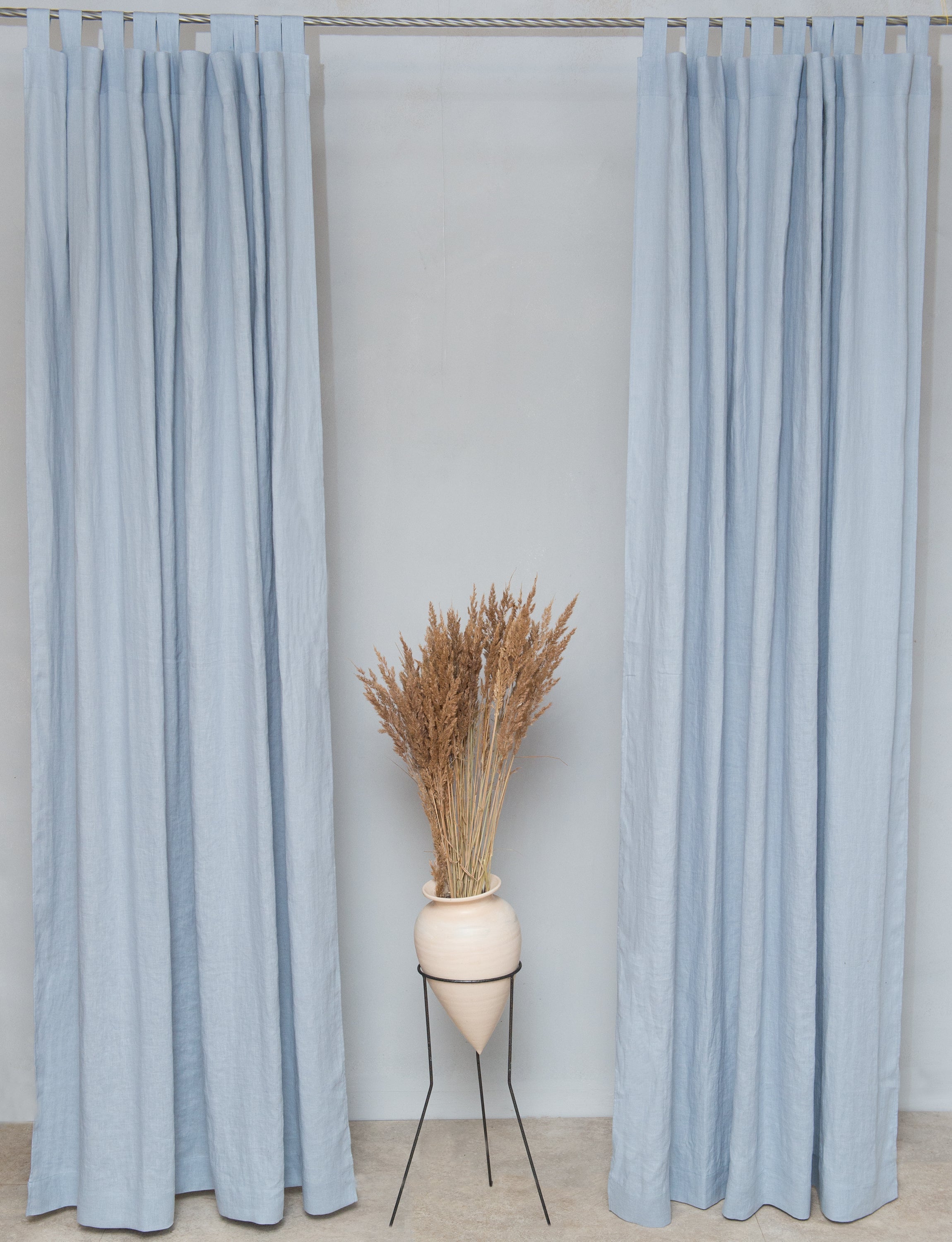 Dark plum linen curtain with tab tops from Magenta Sugarplum, featuring a soft, textured fabric for elegant home decor.