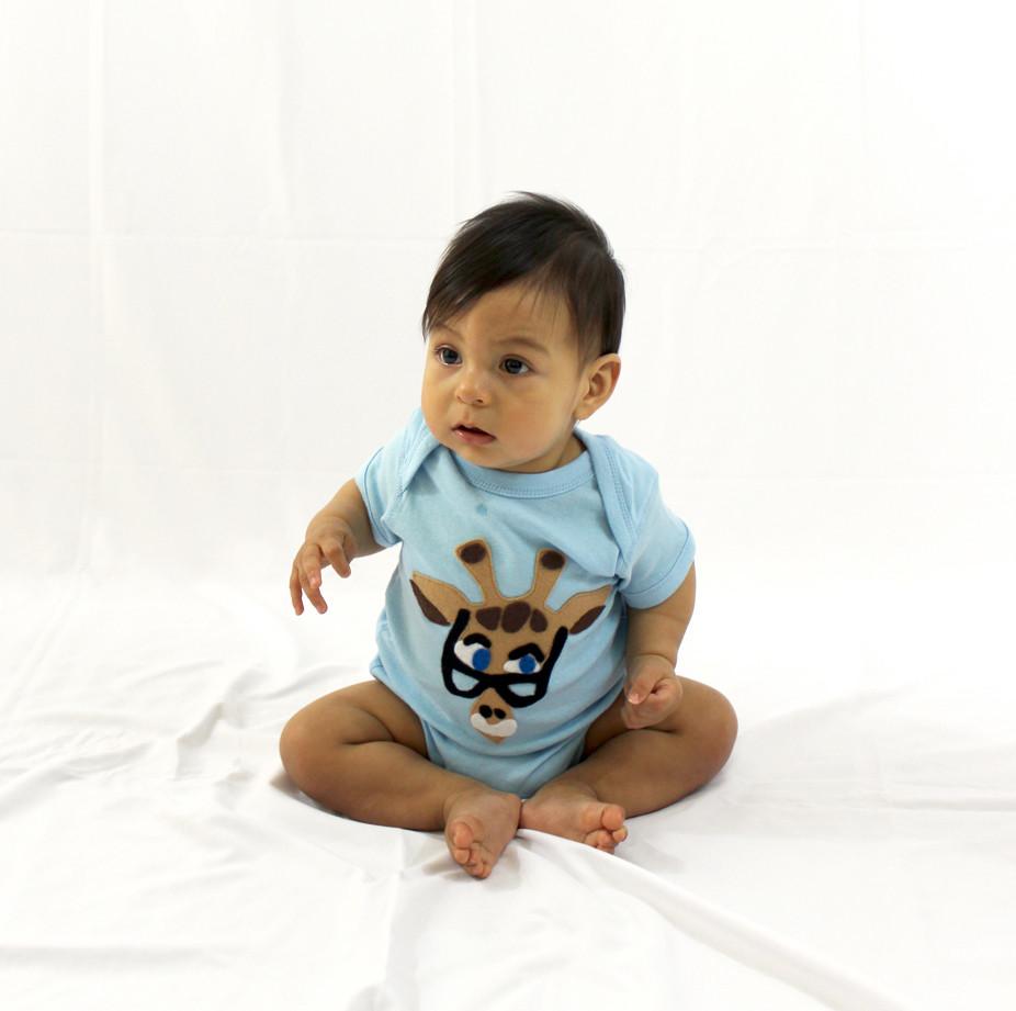 Sky Blue Milo Baby Onesie Mitford by Mi Cielo x Donald Robertson, featuring a soft fabric and playful design for infants.