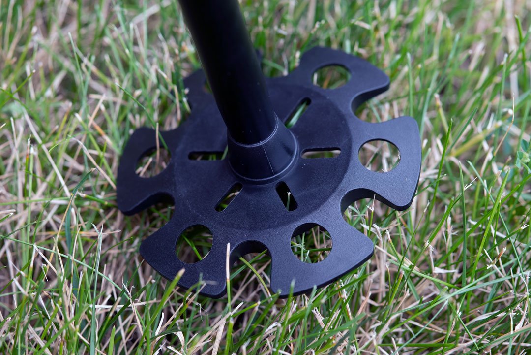 Pair of Triangulum trekking poles with large snow powder sand baskets, suitable for hiking and camping in snowy or sandy terrain.