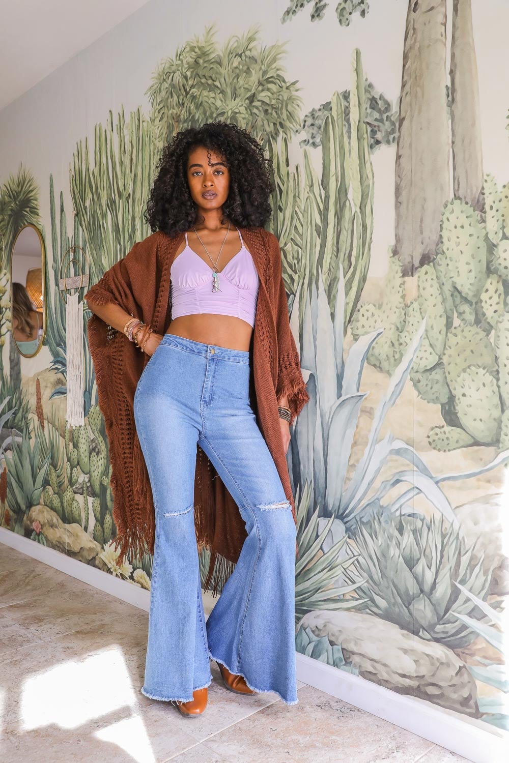 Open work frayed bohemian ruana in brown, stylish accessories by Periwinkle Aether, featuring a lightweight, open-knit design with frayed edges.