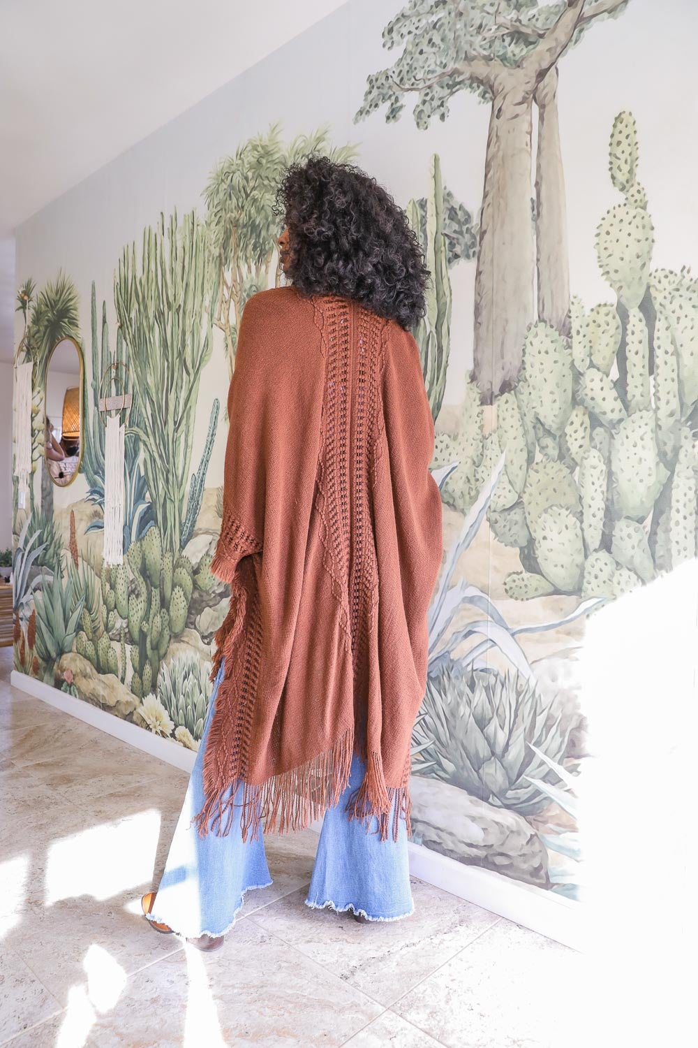 Open work frayed bohemian ruana by Periwinkle Aether, lightweight accessories with a relaxed, open-knit design and fringed edges.