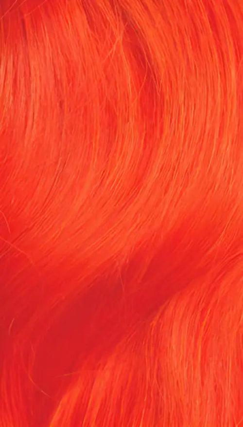 Orange Moni bold Afro Mohawk wig by Peach Clymene featuring kinky curly and afro curly textured hair style.