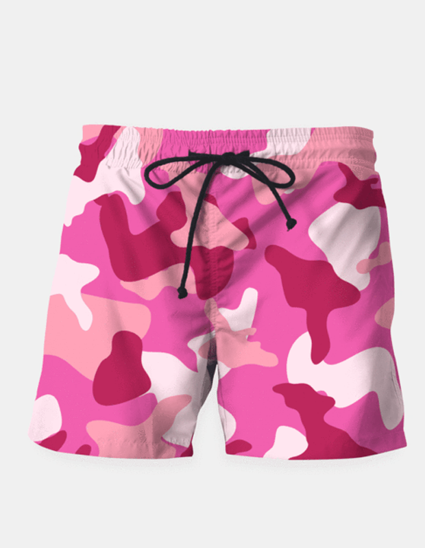 Pink camouflage army pattern shorts by Sky Felix, styled with a casual T-shirt, showcasing a trendy, vibrant design.