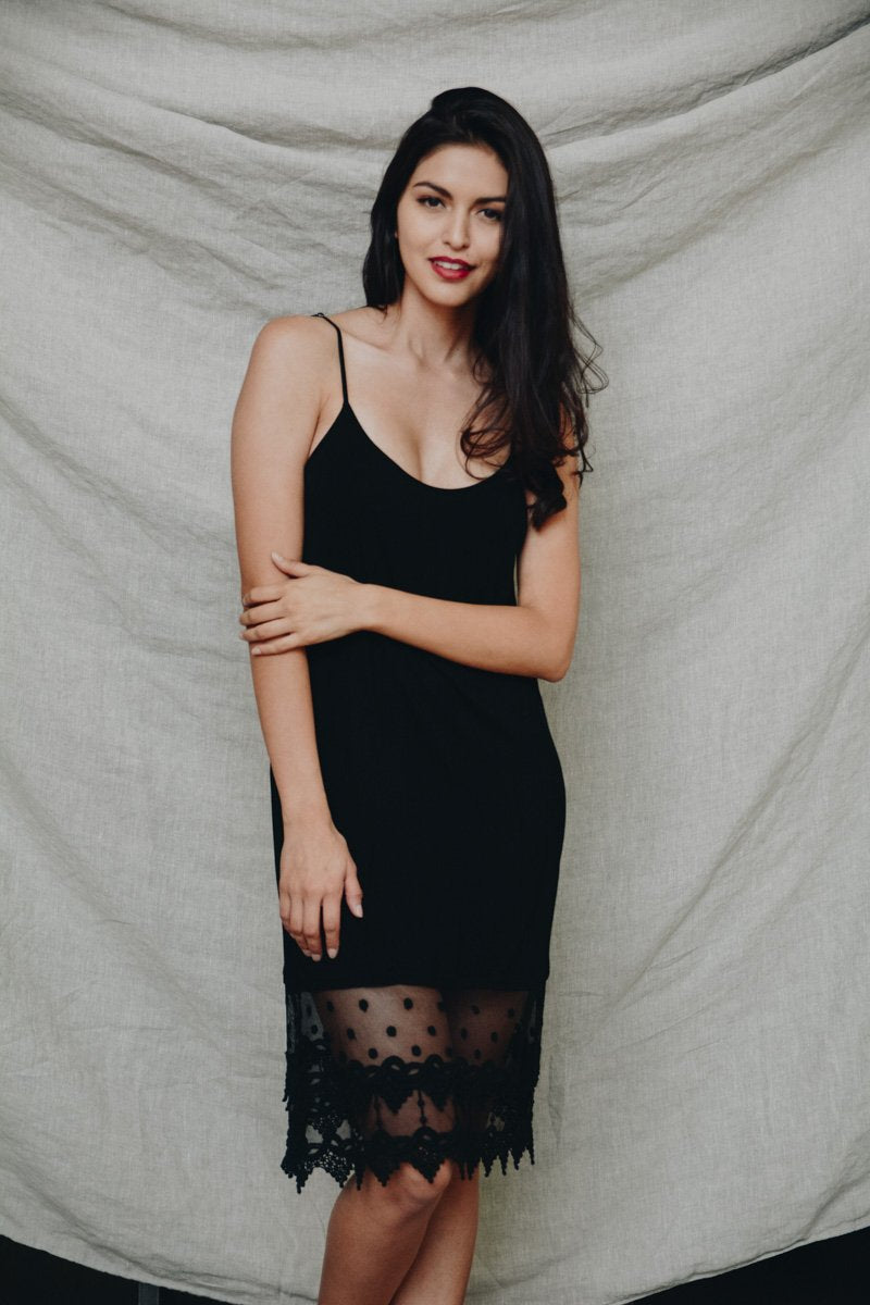 Black polkadot lace slip dress by Periwinkle Aether, featuring delicate lace details and a fitted silhouette.