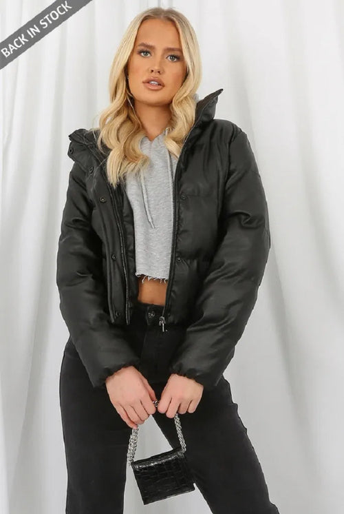 Black PU Boxy Puffer Jacket by Rose Eleusis, showcasing a stylish, cropped puffer coat with a quilted design and stand-up collar.