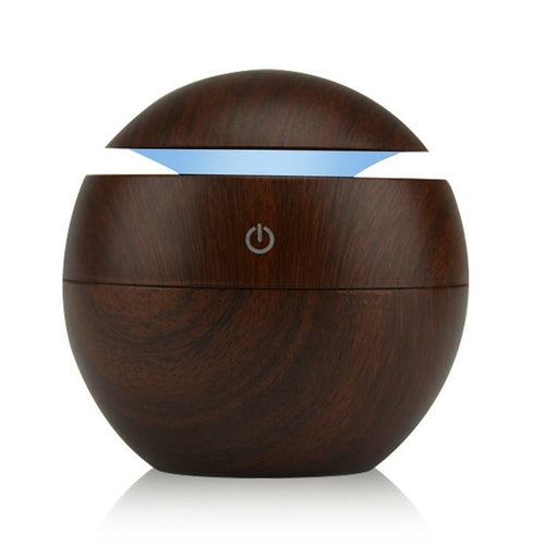Jade USB ultrasonic cool mist humidifier with 7 color-changing LED lights, designed for portable air purification and moisture.